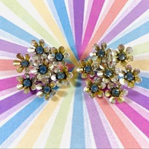 Large soft gold-tone daisy cluster clip earrings baby blue rhinestone centers
